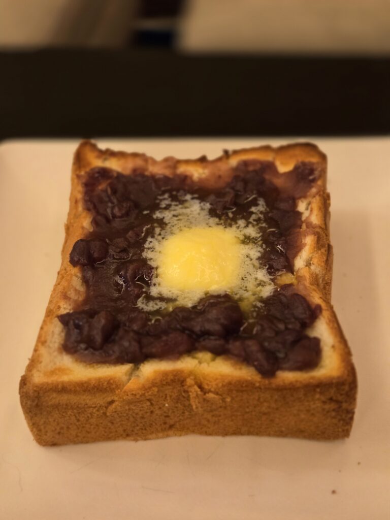 Thick-cut toast topped with sweet red bean paste and butter at Cafe Fugetsu in Gion